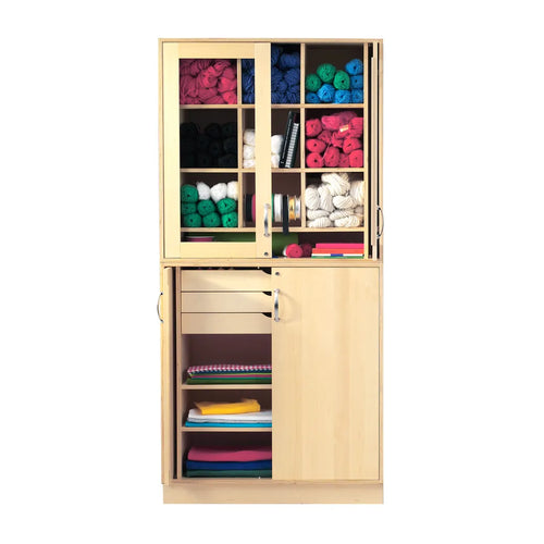 Sjöbergs Skåp 1, glas/björkdörrar, textilslöjd